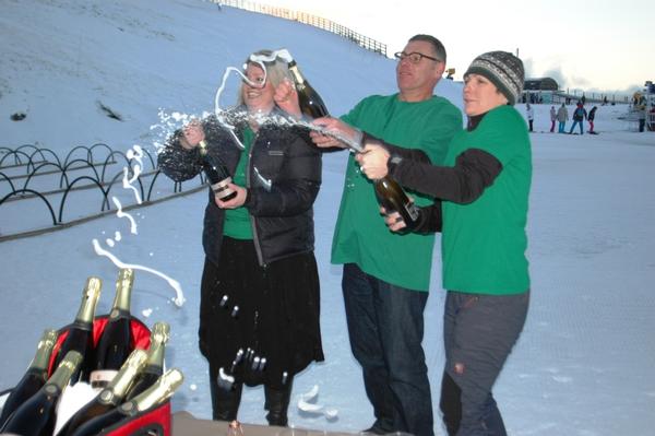 Arcadia bubbles popped to celebrate opening, Amisfield staff lending a hand (L-R) Olivia Herbert, Scott Nickerson and Fleur Caulton